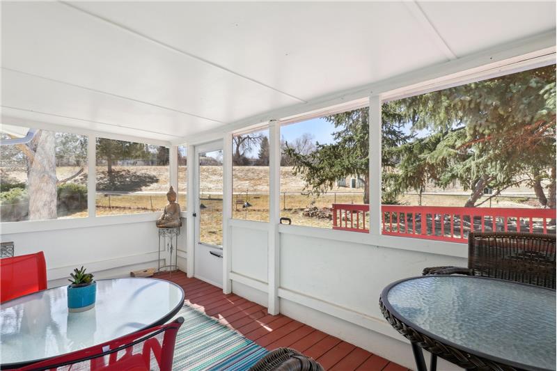 Enclosed deck (screens, not windows)