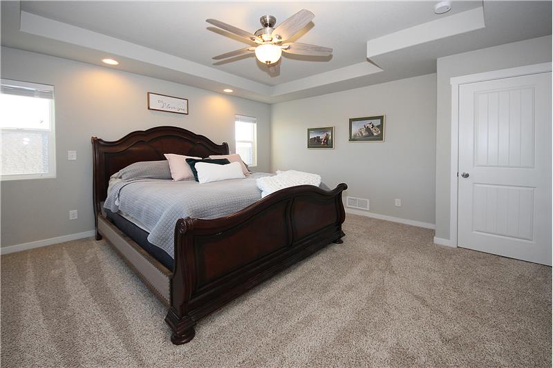 Master bedroom with an adjoining 5-piece bath and walk-in closet