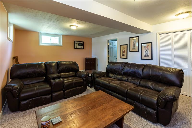 Family room in lower level - 8079 Wirthington Rd