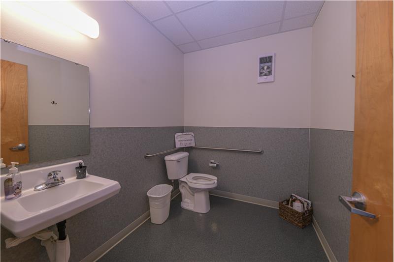 One of four half bathrooms in building