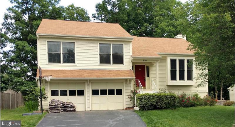 Front with 2 car garage
