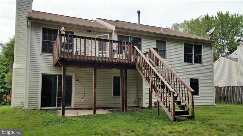 Back with large deck right off the kitchen