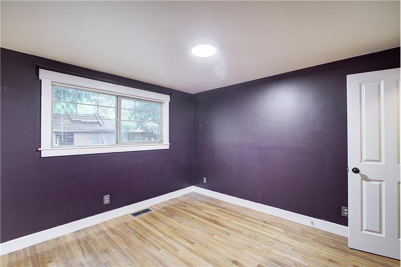 Primary Bedroom with 1/2 bath toilet & sink