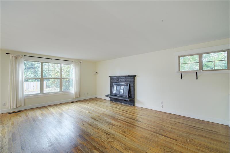 Lots of light from South facing windows. Fireplace is for decoration only