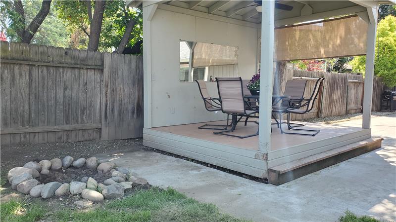 The Gazebo has a Ceiling Fan w Lights as Well as a Roll-up Sunscreen