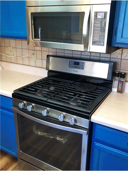 Stainless microwave and gas range/oven