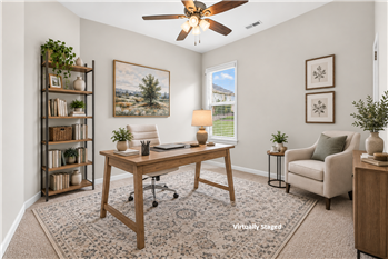 Flexible floorplan: one of two bedrooms at the front of the home virtually staged as a home office.