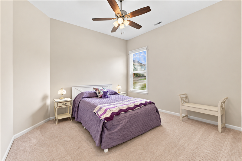 One of two bedrooms at the front of the home.