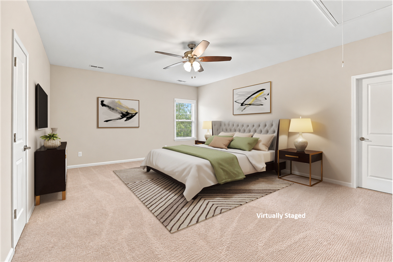 Flexible floor plan: virtually staged, one of two spacious bedrooms on home's upper floor.