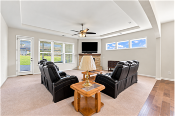 Oversized great room offers plenty of space to stretch out, gather with a crowd or settle in for a cozy night by the fire.