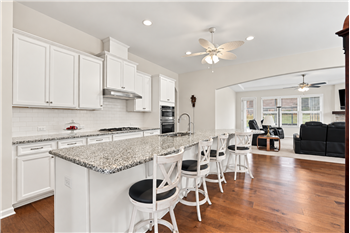 Kitchen features open sight lines to the great room, keeping conversation flowing and everyone connected while cooking.