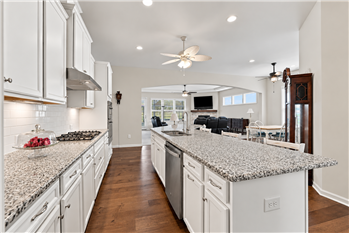 A dream kitchen with exceptional counter and storage space, gorgeous cabinetry and room for everything exactly where you need it