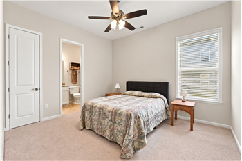 Bedroom suite on main floor ideal for guests or family members who can't easily navigate stairs.