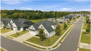 Home situated on a beautifully landscaped corner lot. In-ground irrigation keeps it lush and green.