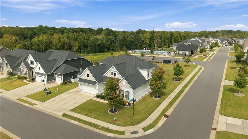 Home situated on a beautifully landscaped corner lot. In-ground irrigation keeps it lush and green.