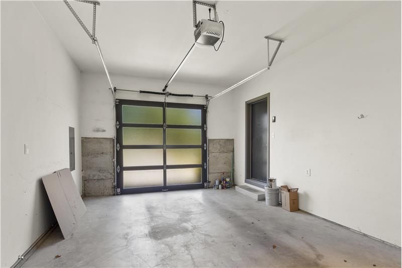 Garage is spacious! Room for the car and storage!