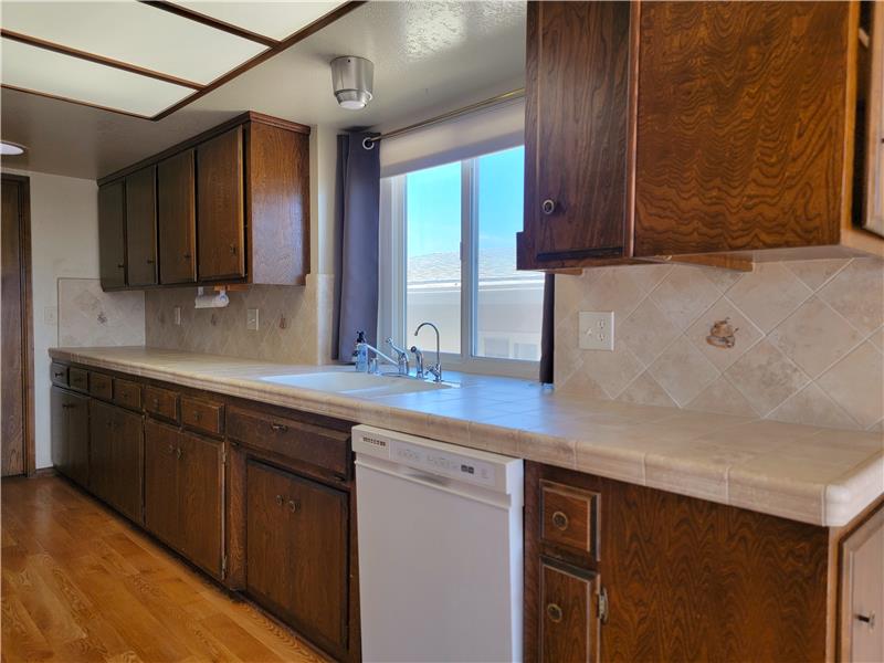 Another great feature of this galley Kitchen is the length provides opportunity for lots of Counter and Cabinet Space!!