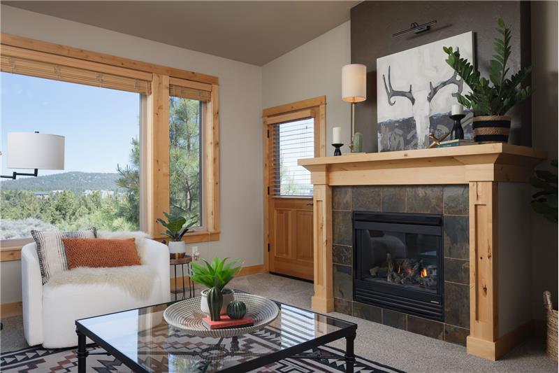 Enjoy the gar fireplace during the winter months and the beautiful sunsets from your back patio