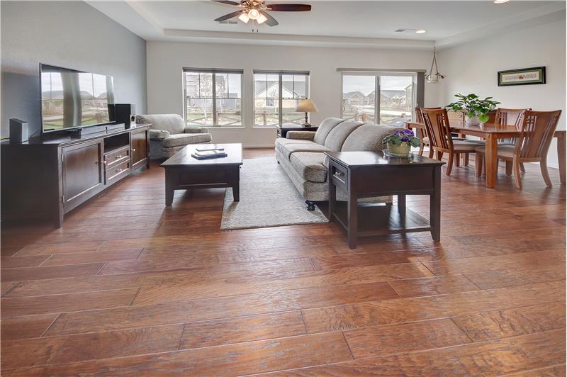 Beautiful, engineered hardwood floors through the Entry, Kitchen, Dining Area, and Great Room