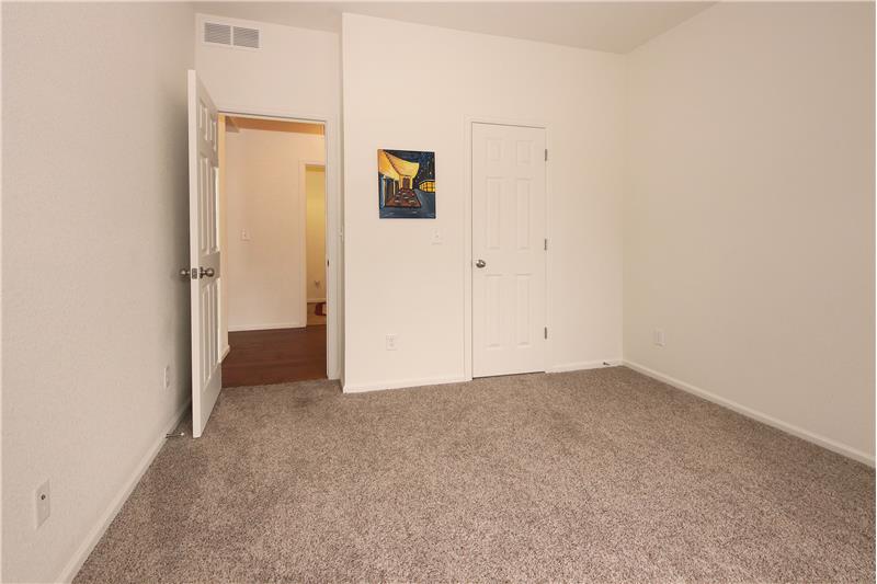 Main level front Bedroom with walk-in closet