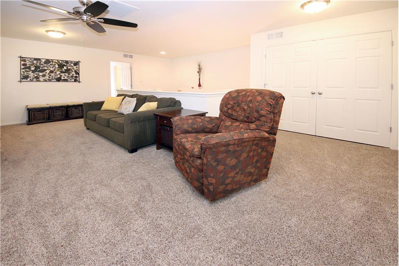 The upper-level loft is a great area for movie or game night