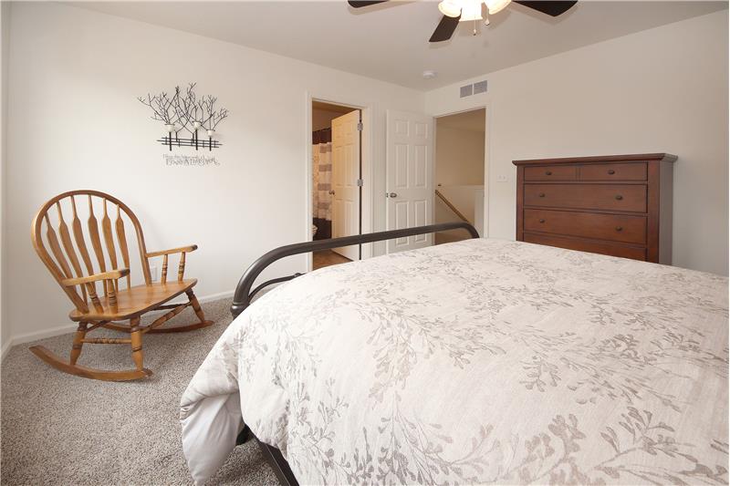 Upper-level Bedroom #3 into the ensuite Bathroom