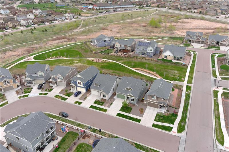 Aerial view of home, open space and trails