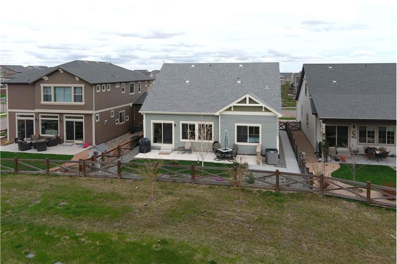 Rear views of home and fenced backyard