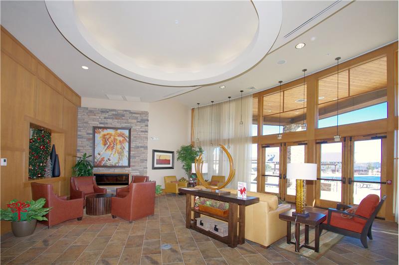 Interior sitting room of the Ranch House with views of the outdoor pool