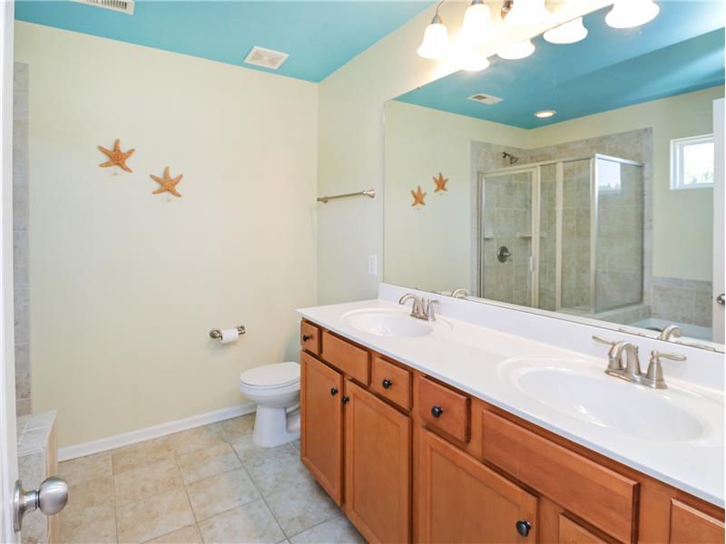 Primary bathroom with double sink vanity