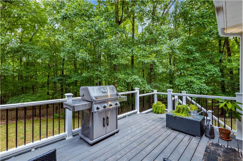 Deck conveniently located just off the kitchen... perfect for grilling.