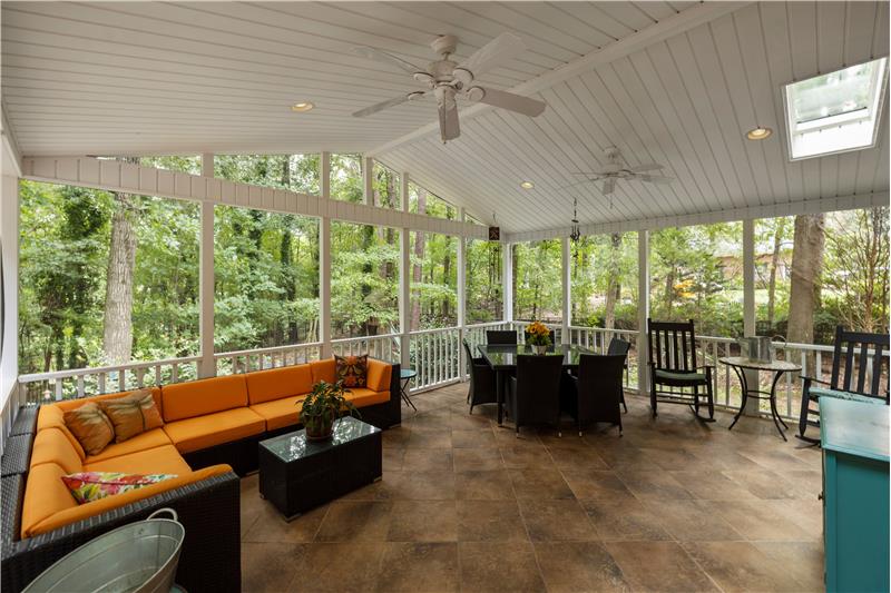 382 square foot screened porch extends home's living and entertaining spaces.