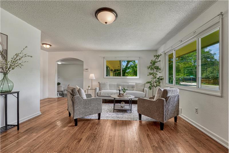 Hardwood flooring through the living room and bedrooms