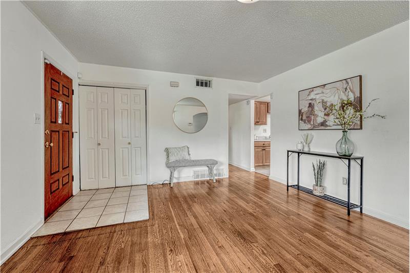 Back inside, view of the entry with coat closet