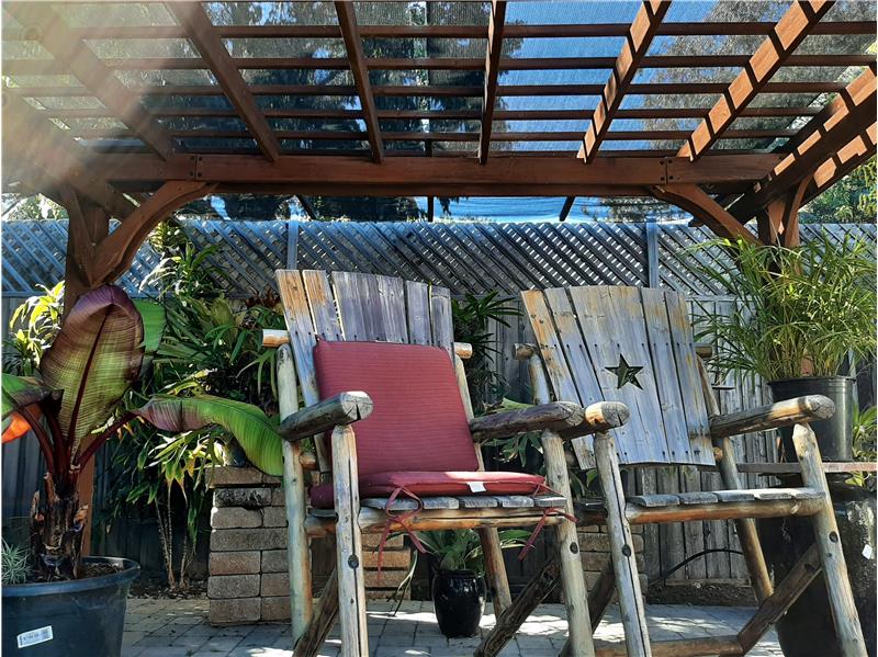 Beautiful Pergola with filtered light allows for more outdoor Central Coast living.