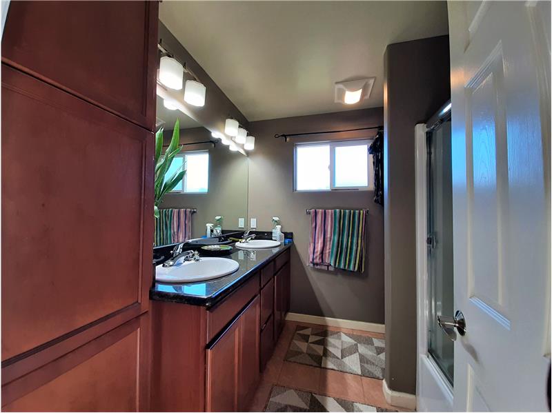 Natural Earth Tile Floors and Impressive Lighting! Not surprising. (Great remodel!)