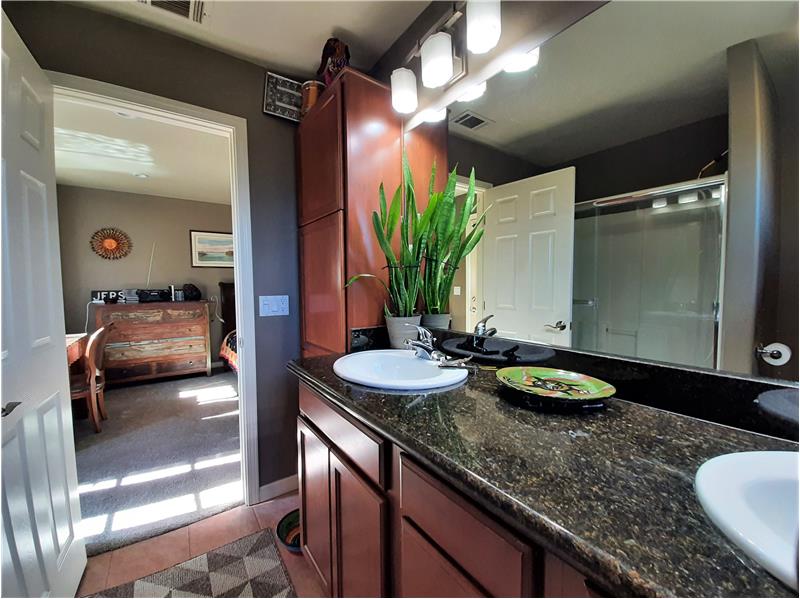 Floor to Ceiling Storage Cabinets in Master Bath is Smart!!