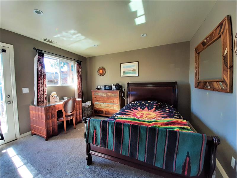 Vinyl windows, with the new central furnace (ceiling vent seen here) makes for low, low utility costs in this wonderful home.