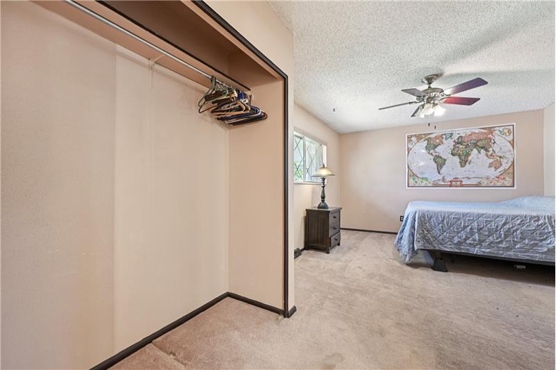 Primary bedroom viewed from closet area