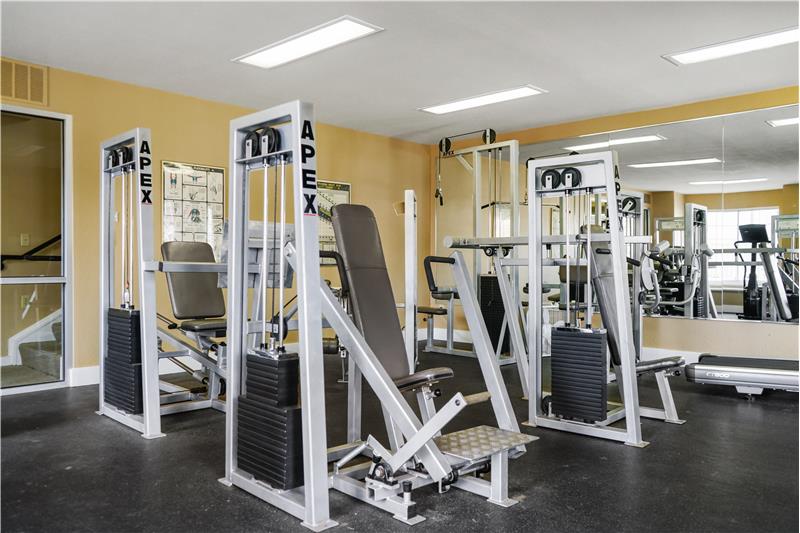 Fitness center is basement of clubhouse
