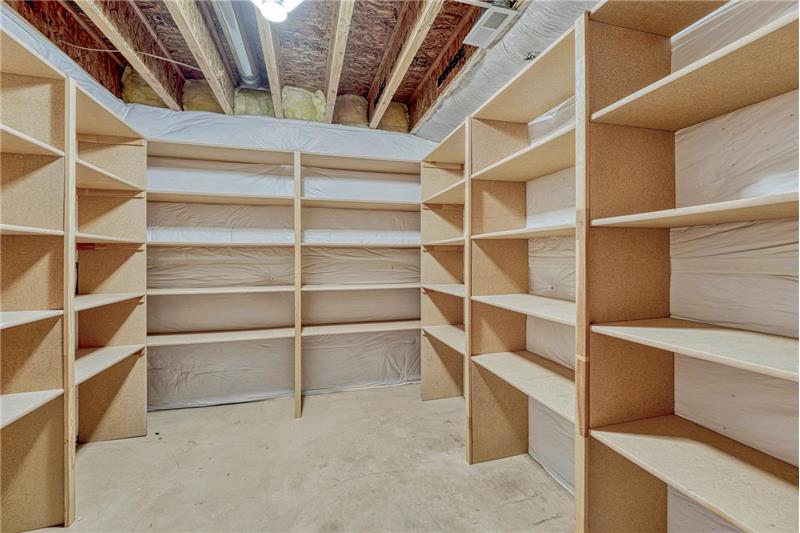 Basement Storage Room with built-in shelves.