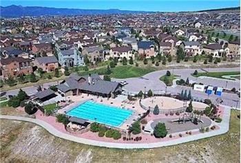Aerial view of the Wolf Ranch Community Center, pool, and splash park.