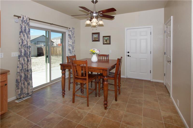 Dining area provides a walk out to the large patio in the backyard