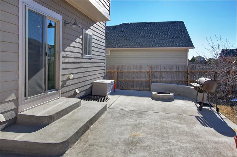 15 x 46 back patio with built-in fire pit is great for entertaining