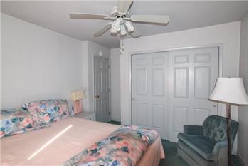First floor bedroom with  fan