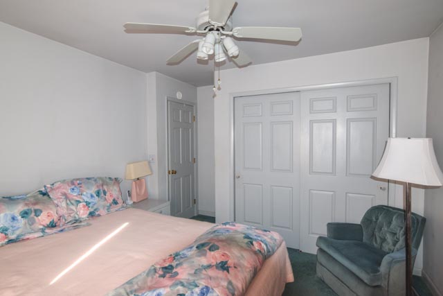 First floor bedroom with  fan