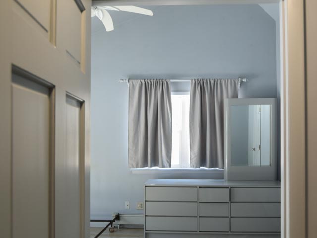 Bedroom with  vaulted ceiling and closet