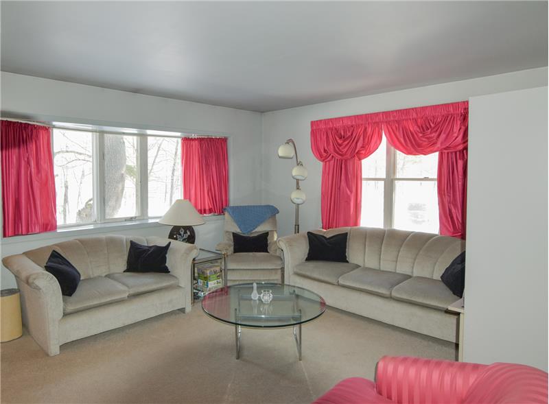 Large windows with view of the woods