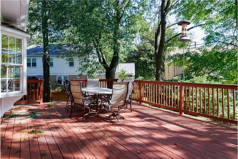 You'll enjoy outdoor living from the custom deck