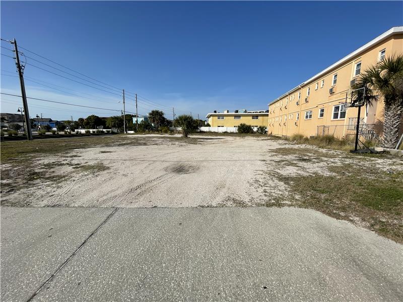 From Gulf Blvd, TO rear of lot